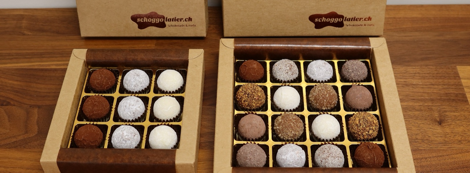 Pralinés in Geschenk-Schachteln von Schoggolatier